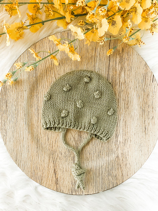 Knitted Baby Bonnet, Unisex Bobble Baby Hat in Sage Green, Newborn Photo Prop